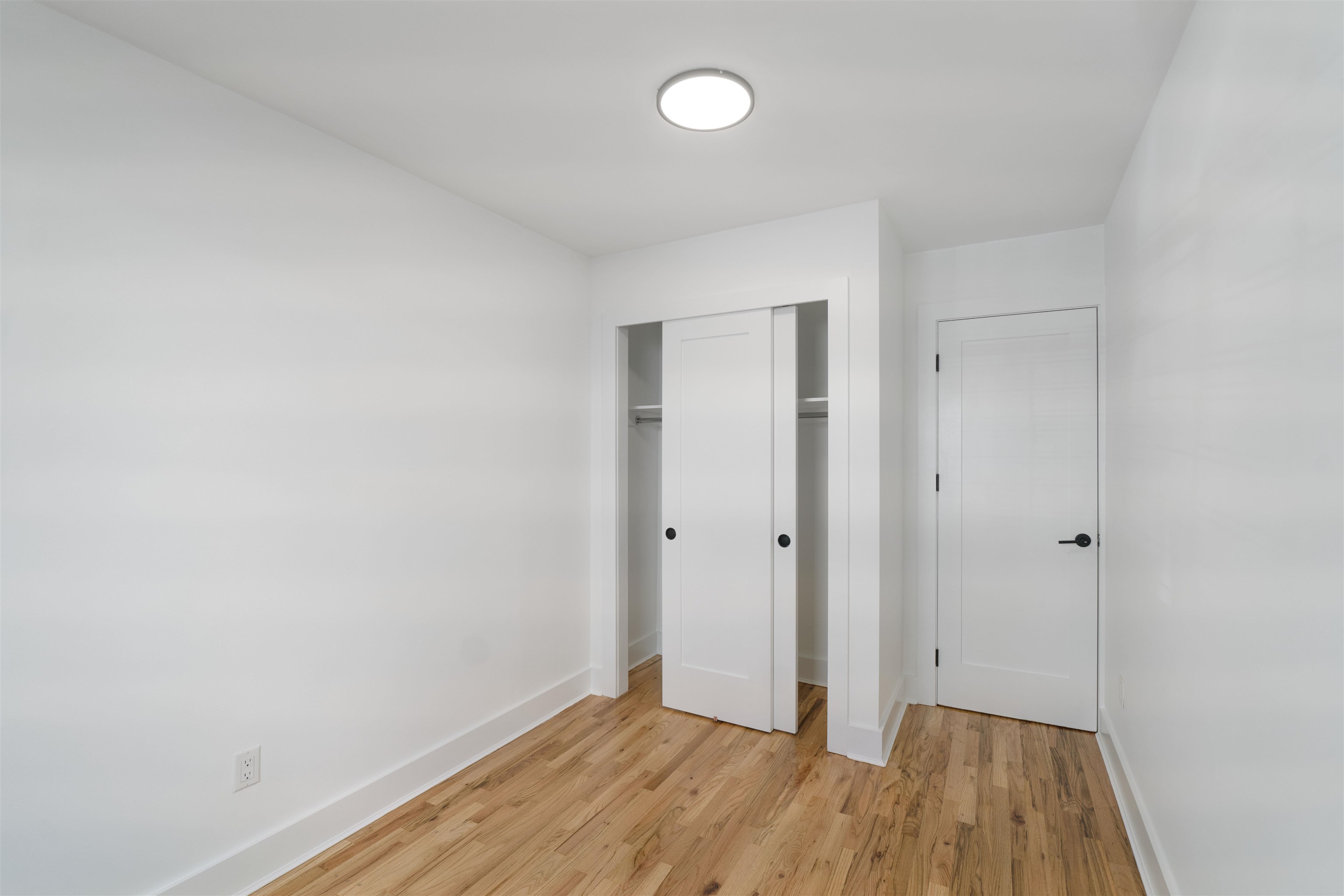 163 3rd Street, Unit 1A Hoboken, NJ 07030 - Photo 9 of 12 a view of a room with wooden floor