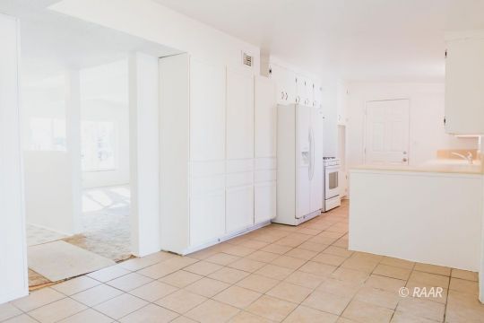 316 West Howell Avenue Ridgecrest, CA 93555 - Photo 11 of 31 a view of a kitchen with white cabinets