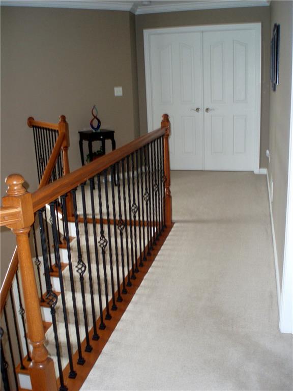 106 Rochelle Lane Monaca, PA 15061 - Photo 14 of 25 Spacious hallway leading to double doors of the owner's suite!