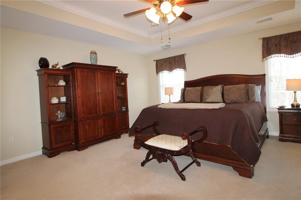 106 Rochelle Lane Monaca, PA 15061 - Photo 15 of 25 Owner's suite with spacious L-shaped walk in closet and a 10 x 10 bonus room to the right of the bed! Note the gorgeous ceiling!