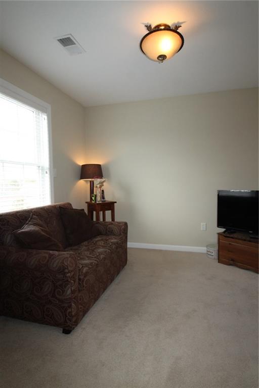 106 Rochelle Lane Monaca, PA 15061 - Photo 16 of 25 10 x 10 bonus room in owner's suite. Could be a nursery, office, craft or exercise room. Original plans of the house had it opening into the hallway as a 4th bedroom