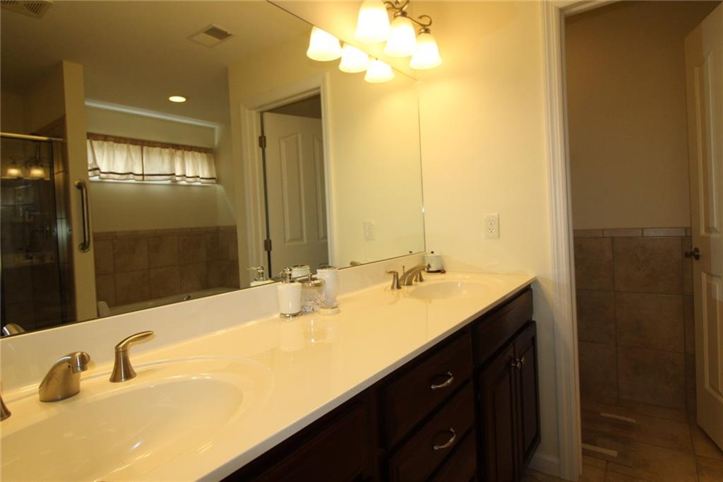106 Rochelle Lane Monaca, PA 15061 - Photo 18 of 25 There is plenty of room on this double sink in the owner's suite for both of you personal items!