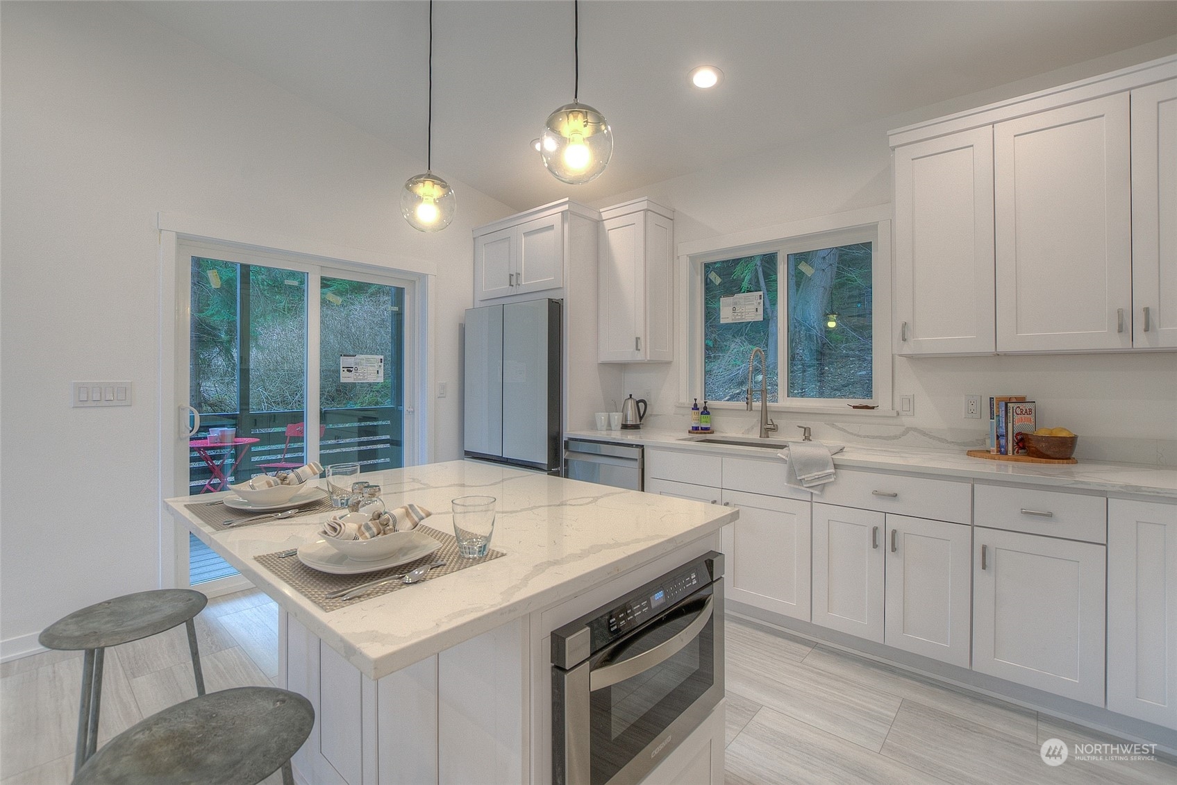 2567 Raccoon Point Road Orcas Island, WA 98245 - Photo 12 of 40 a kitchen with sink cabinets and stove