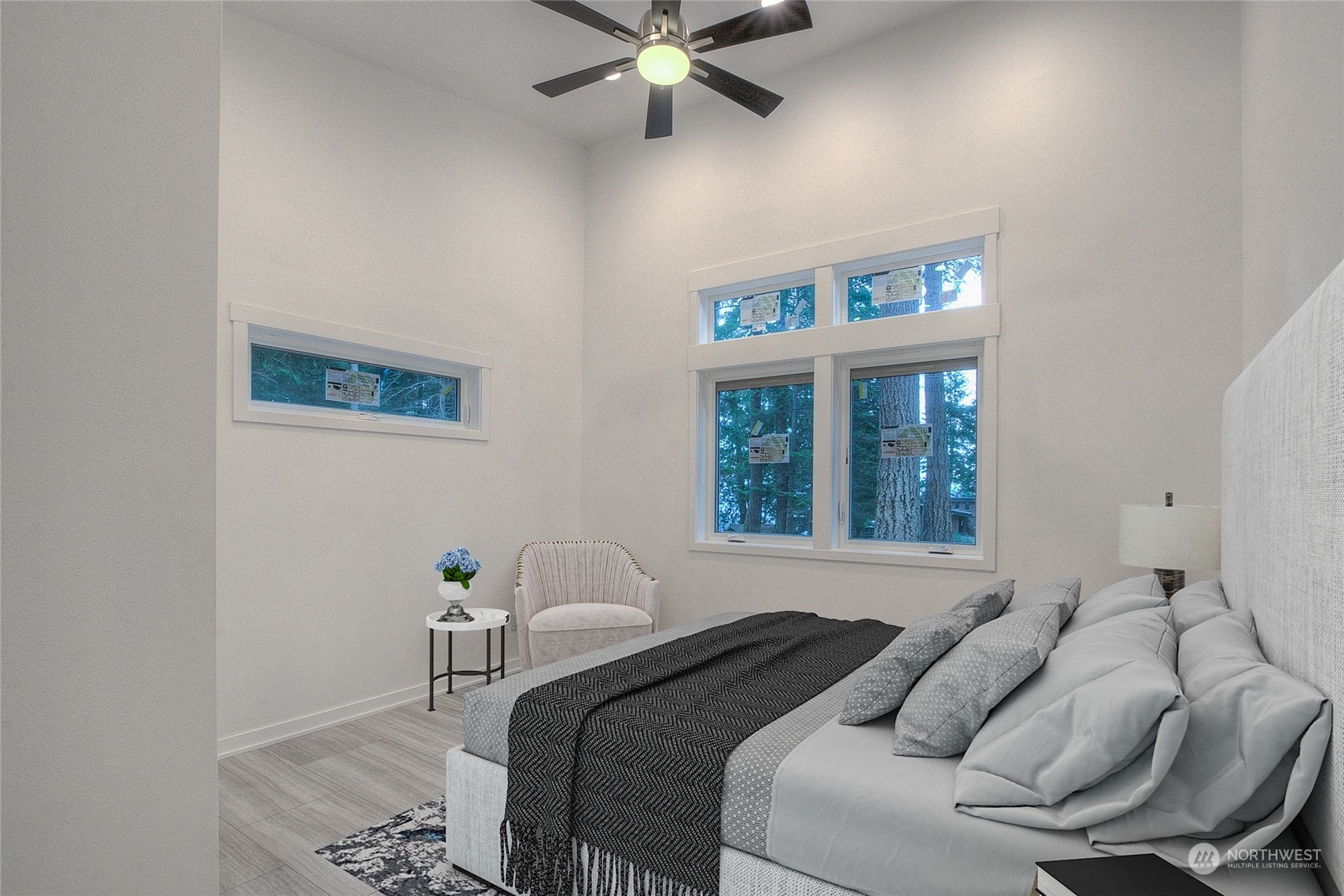 2567 Raccoon Point Road Orcas Island, WA 98245 - Photo 19 of 40 a bedroom with a bed and a window