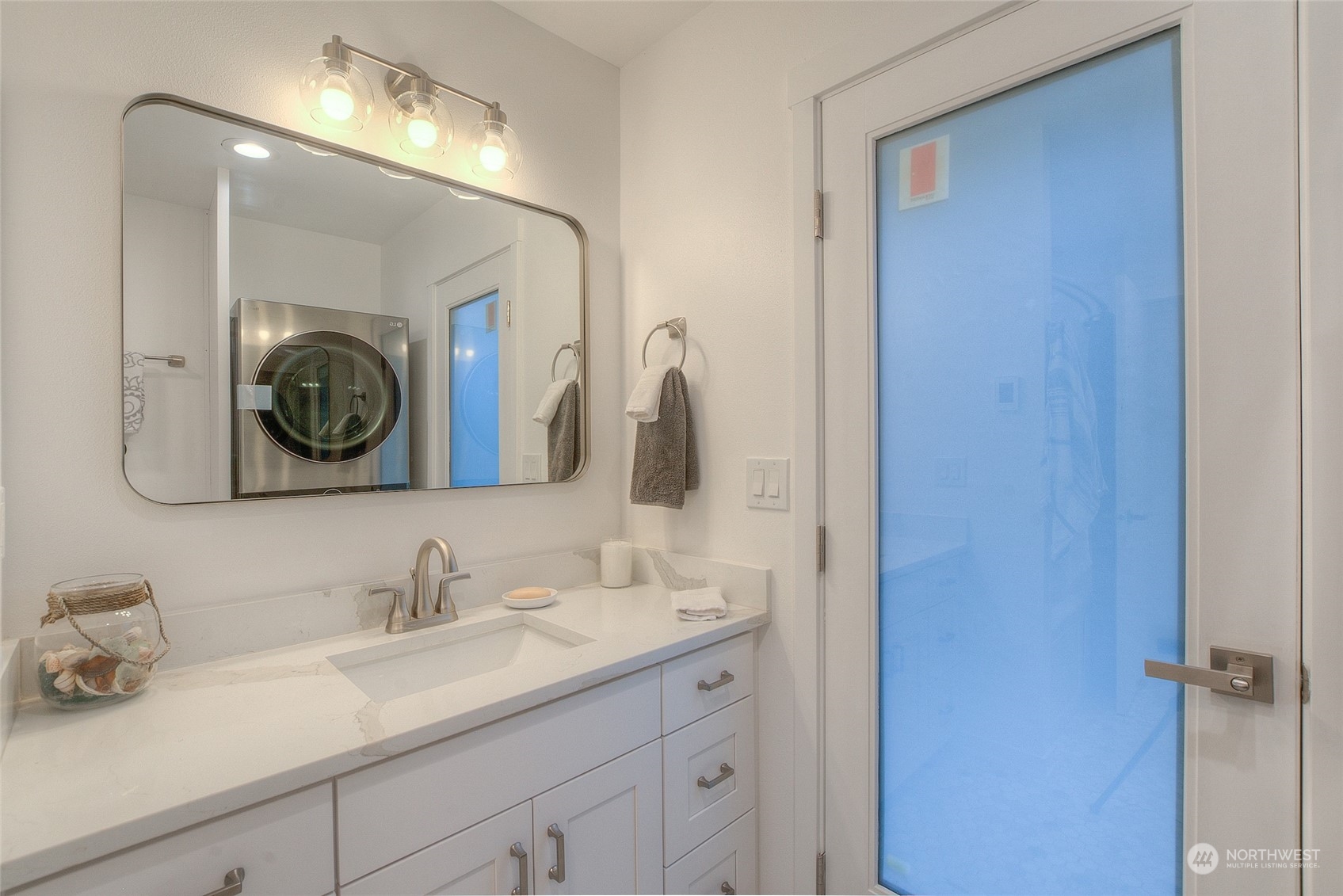 2567 Raccoon Point Road Orcas Island, WA 98245 - Photo 25 of 40 a bathroom with a sink and a mirror
