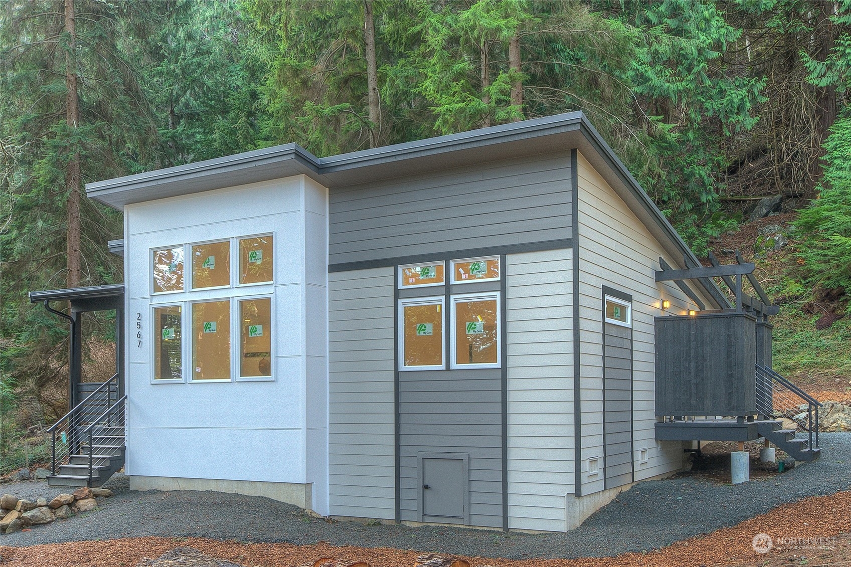 2567 Raccoon Point Road Orcas Island, WA 98245 - Photo 33 of 40 a view of a house with a patio