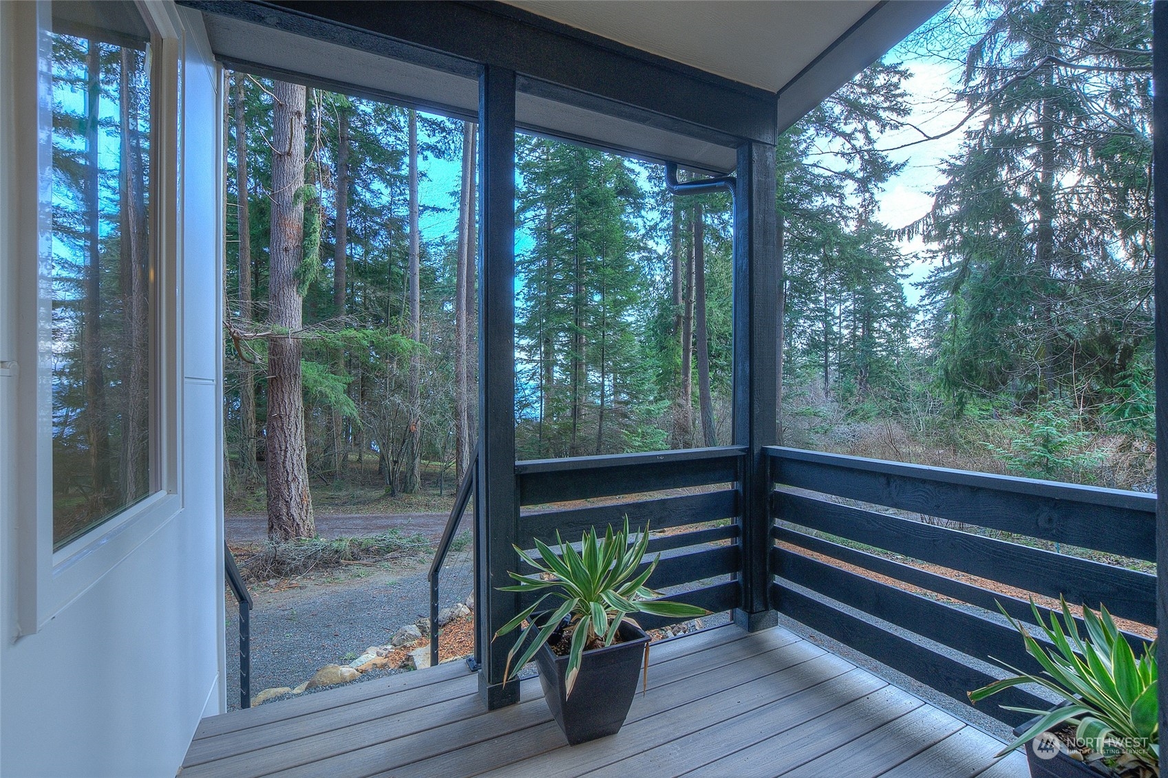 2567 Raccoon Point Road Orcas Island, WA 98245 - Photo 4 of 40 a view of a two chair in the porch