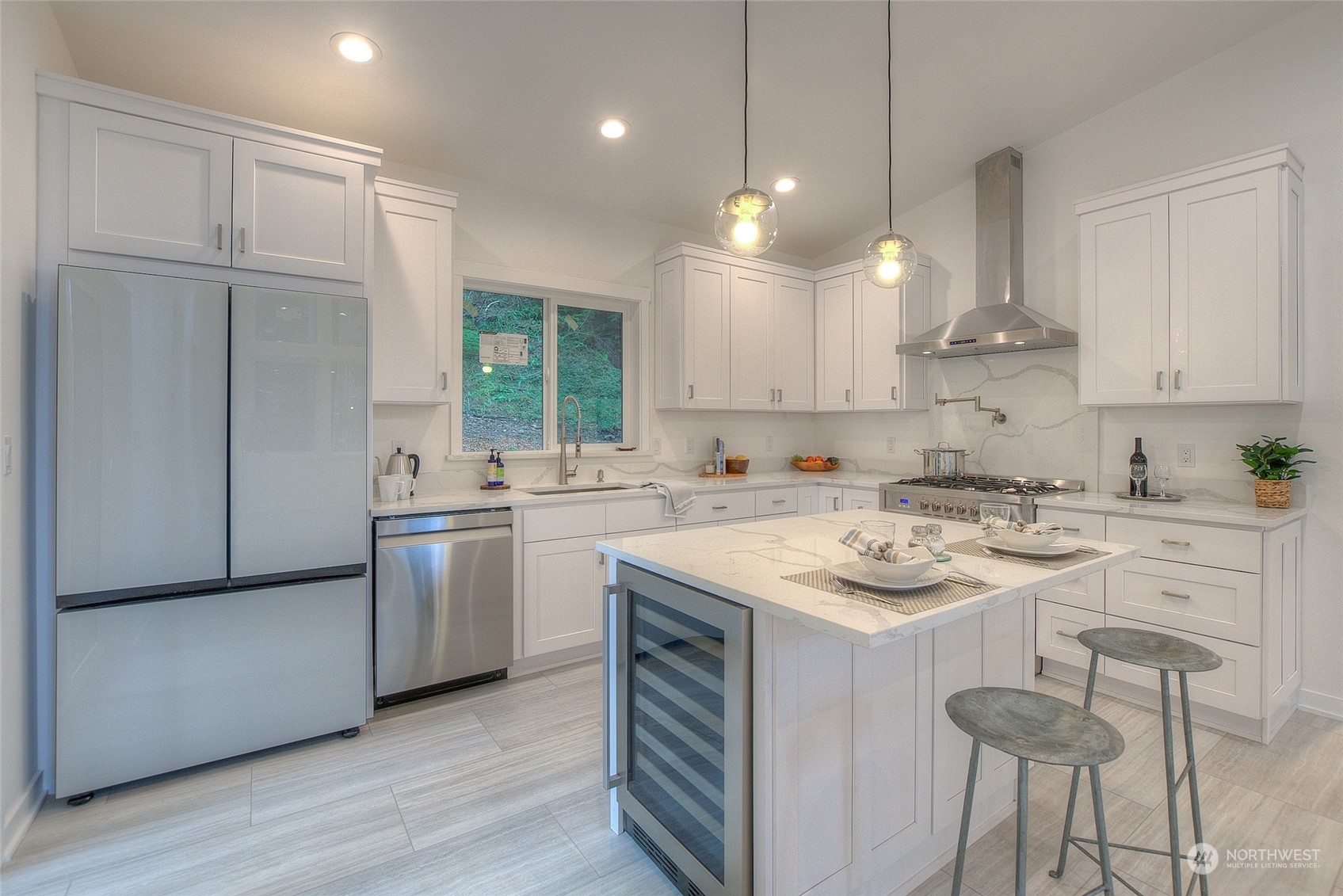 2567 Raccoon Point Road Orcas Island, WA 98245 - Photo 7 of 40 a kitchen with a stove a sink and a refrigerator
