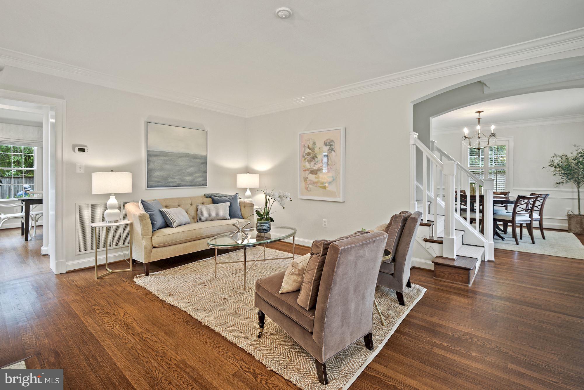 7907 Glenbrook Road Bethesda, MD 20814 - Photo 3 of 40 Hardwood floors and arched doorway
