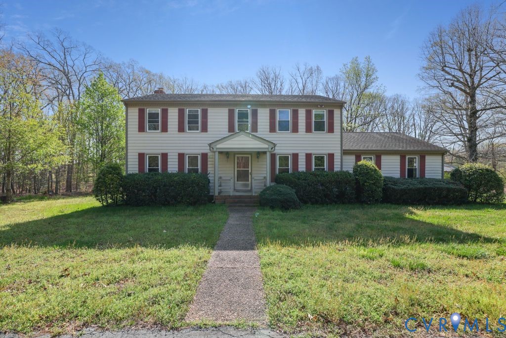 11352 Rockville Road Rockville, VA 23146 - Photo 3 of 38 a front view of a house with a yard and porch