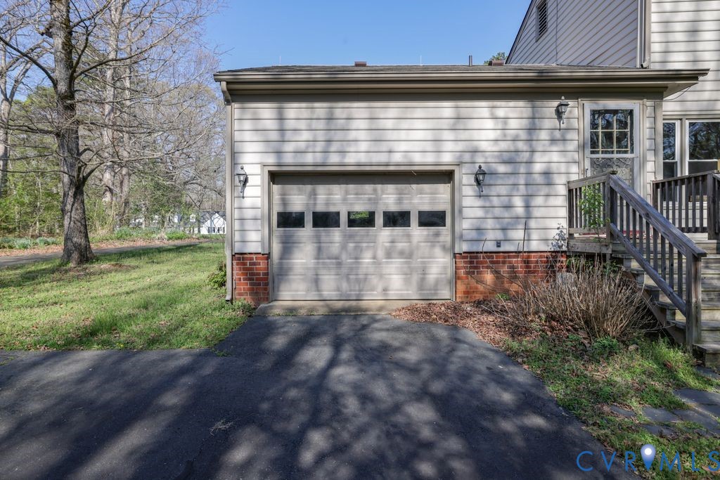 11352 Rockville Road Rockville, VA 23146 - Photo 33 of 38 a view of front of house with a yard