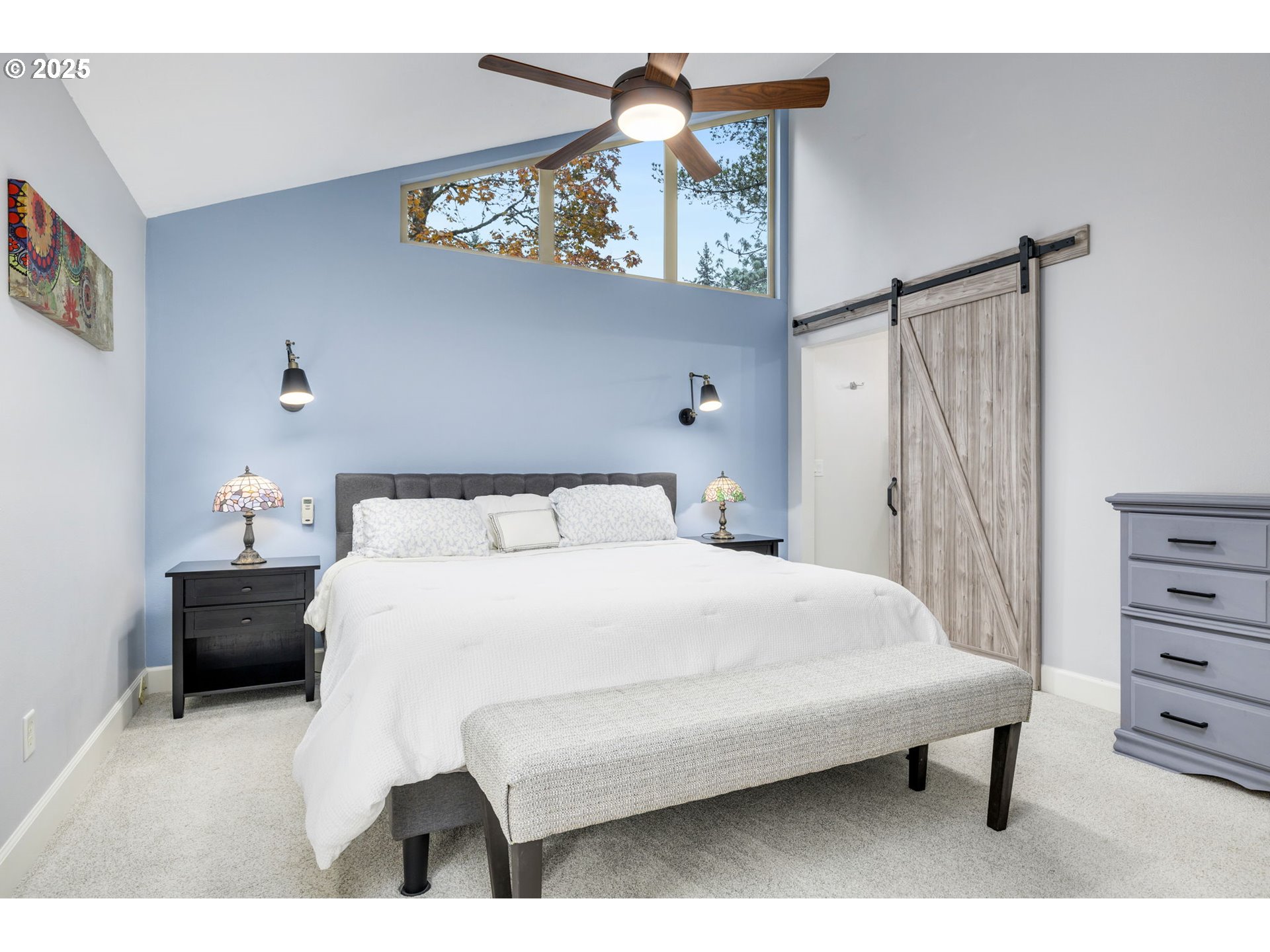 19895 Northwest Nestucca Drive Portland, OR 97229 - Photo 13 of 33 a bedroom with a bed a rug and dresser