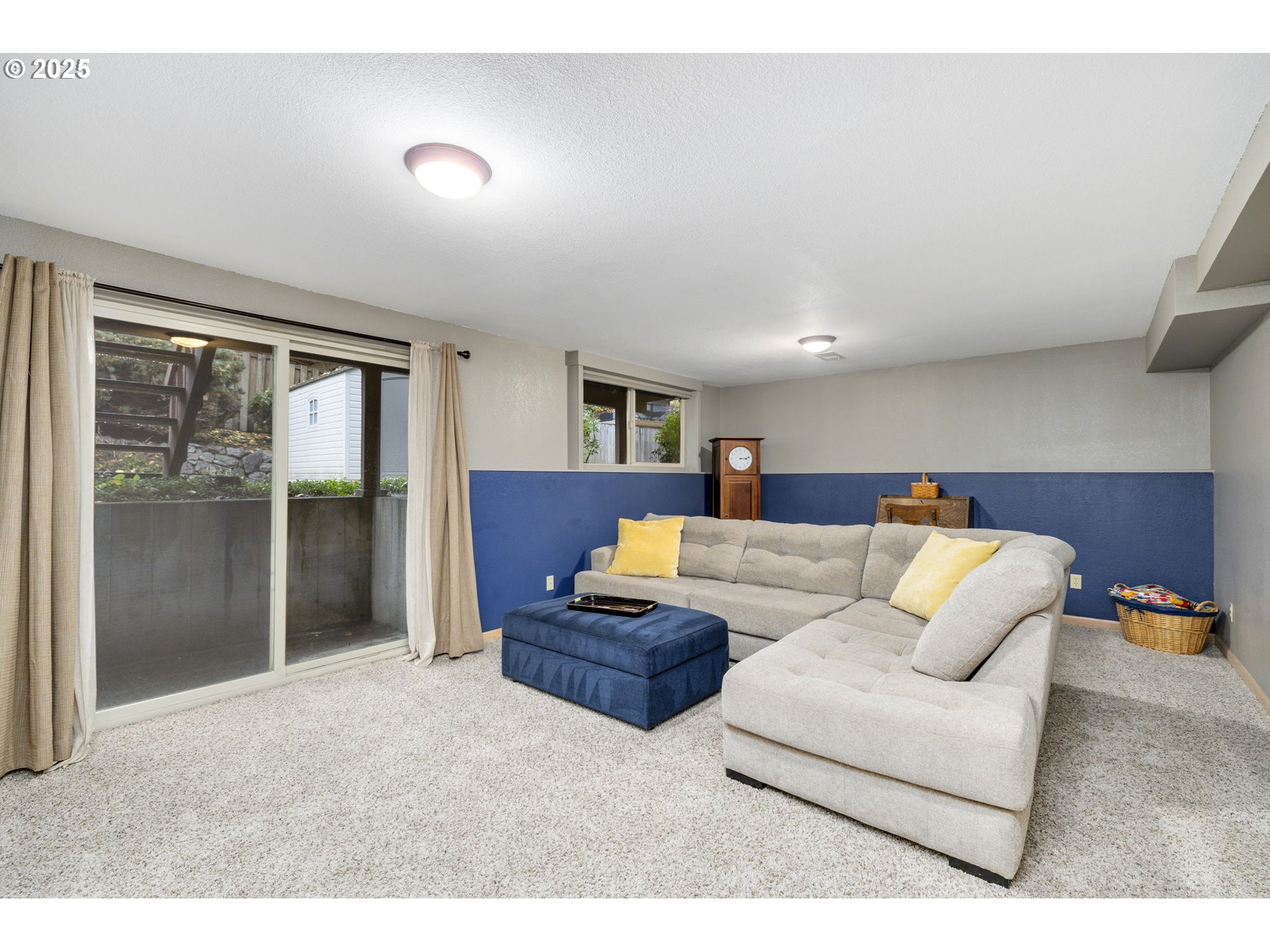19895 Northwest Nestucca Drive Portland, OR 97229 - Photo 19 of 33 a living room with furniture and a window