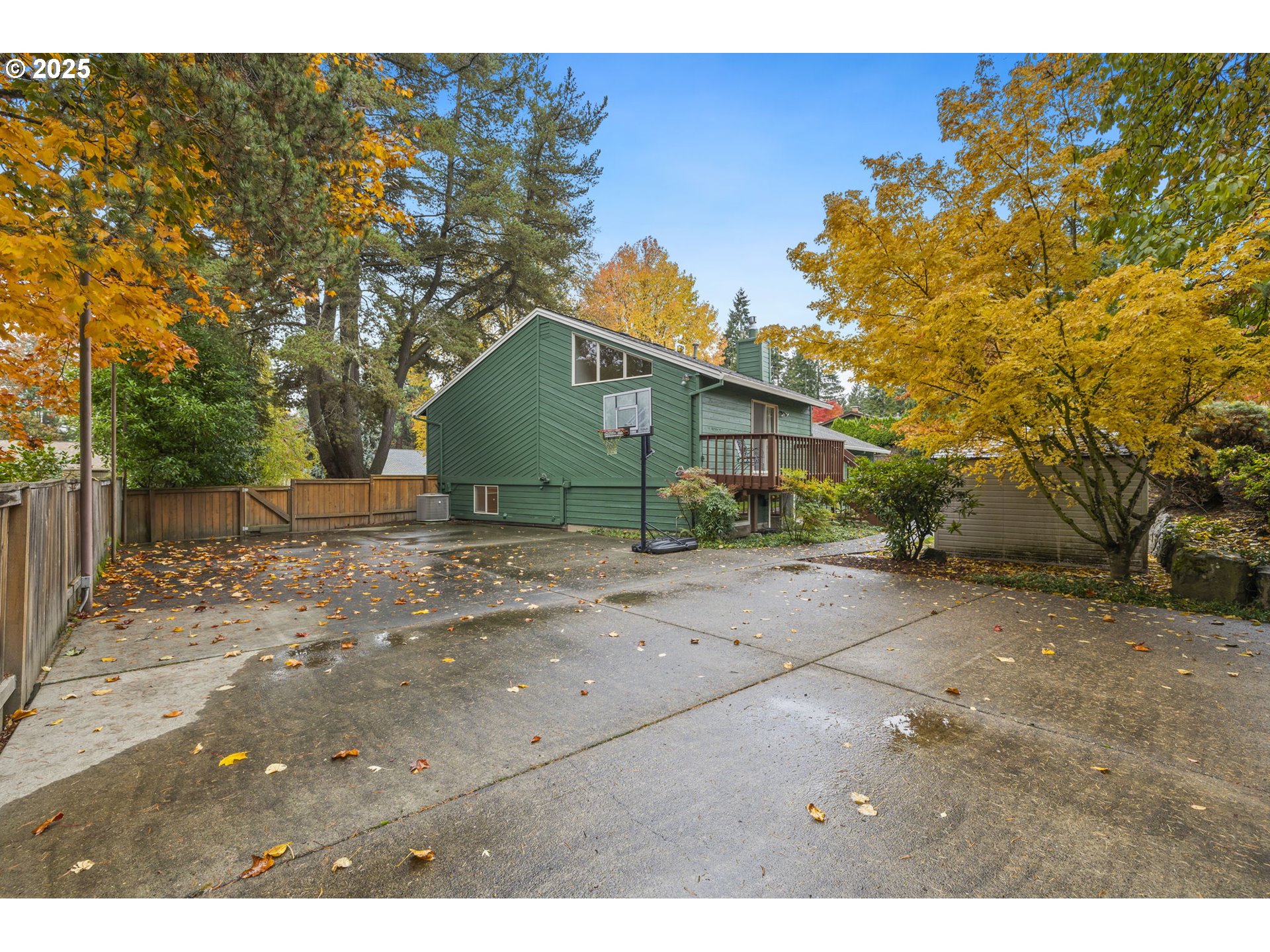 19895 Northwest Nestucca Drive Portland, OR 97229 - Photo 22 of 33 a view of backyard of house