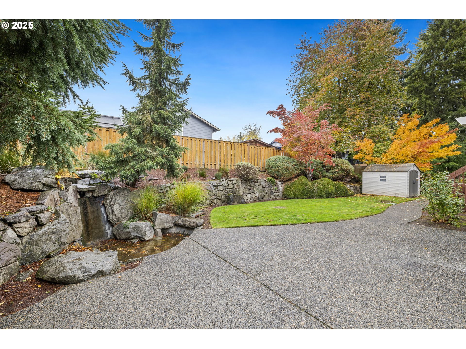 19895 Northwest Nestucca Drive Portland, OR 97229 - Photo 26 of 33 a view of a backyard