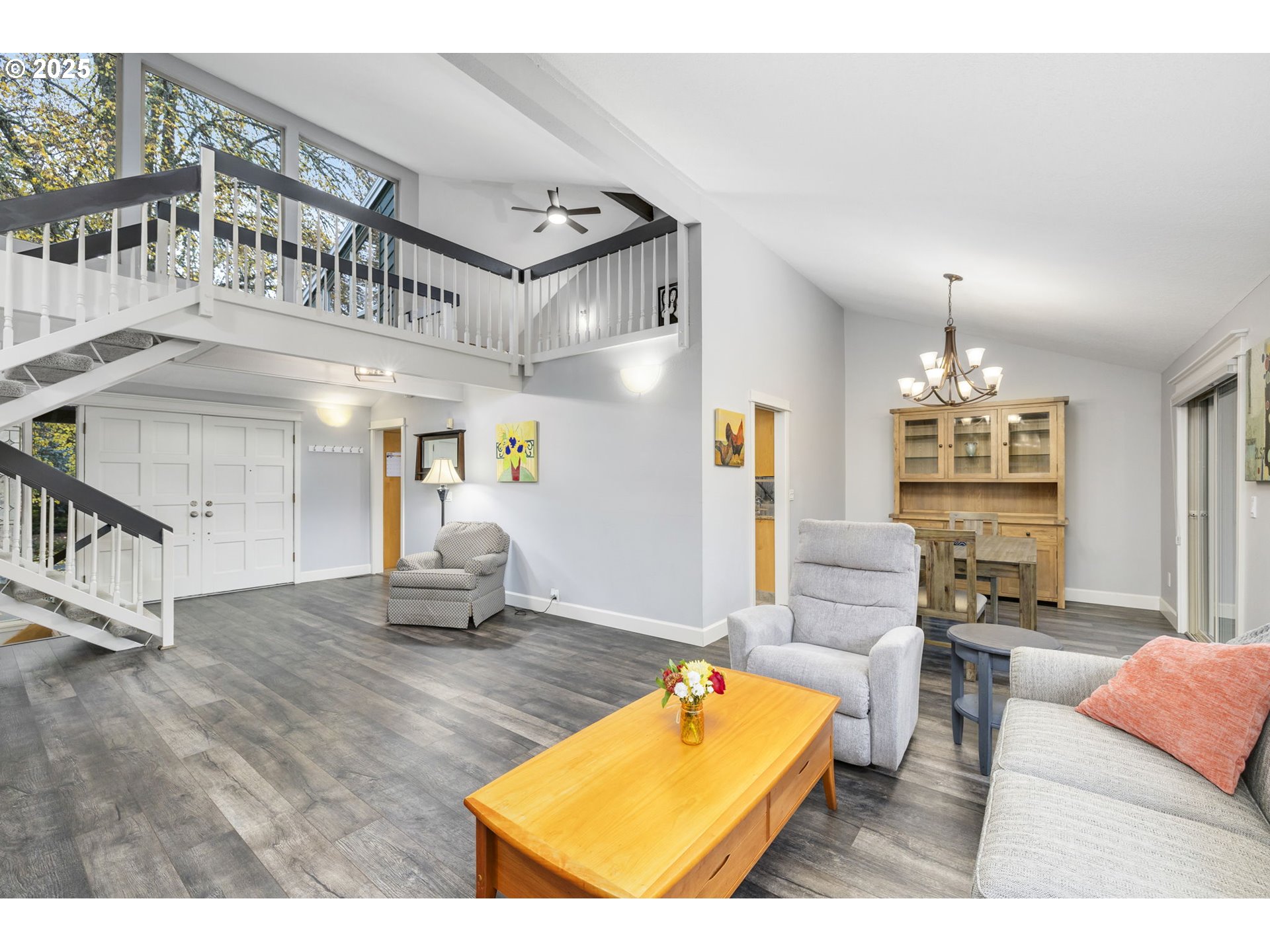 19895 Northwest Nestucca Drive Portland, OR 97229 - Photo 5 of 33 a living room with furniture pool table and a chandelier