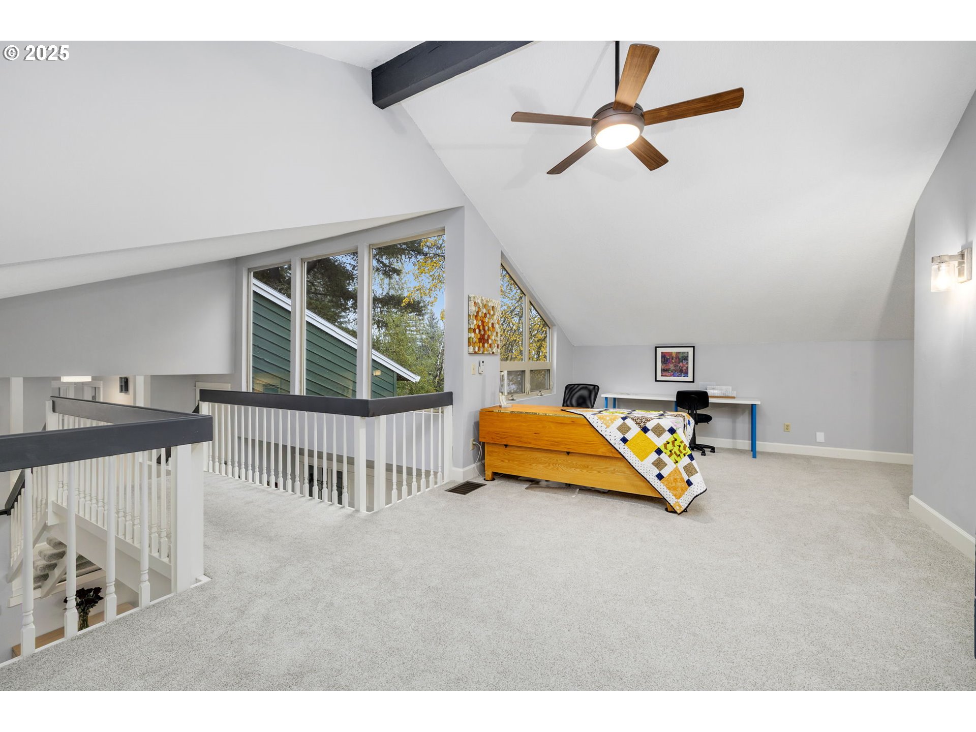 19895 Northwest Nestucca Drive Portland, OR 97229 - Photo 10 of 33 a bedroom with furniture and a window