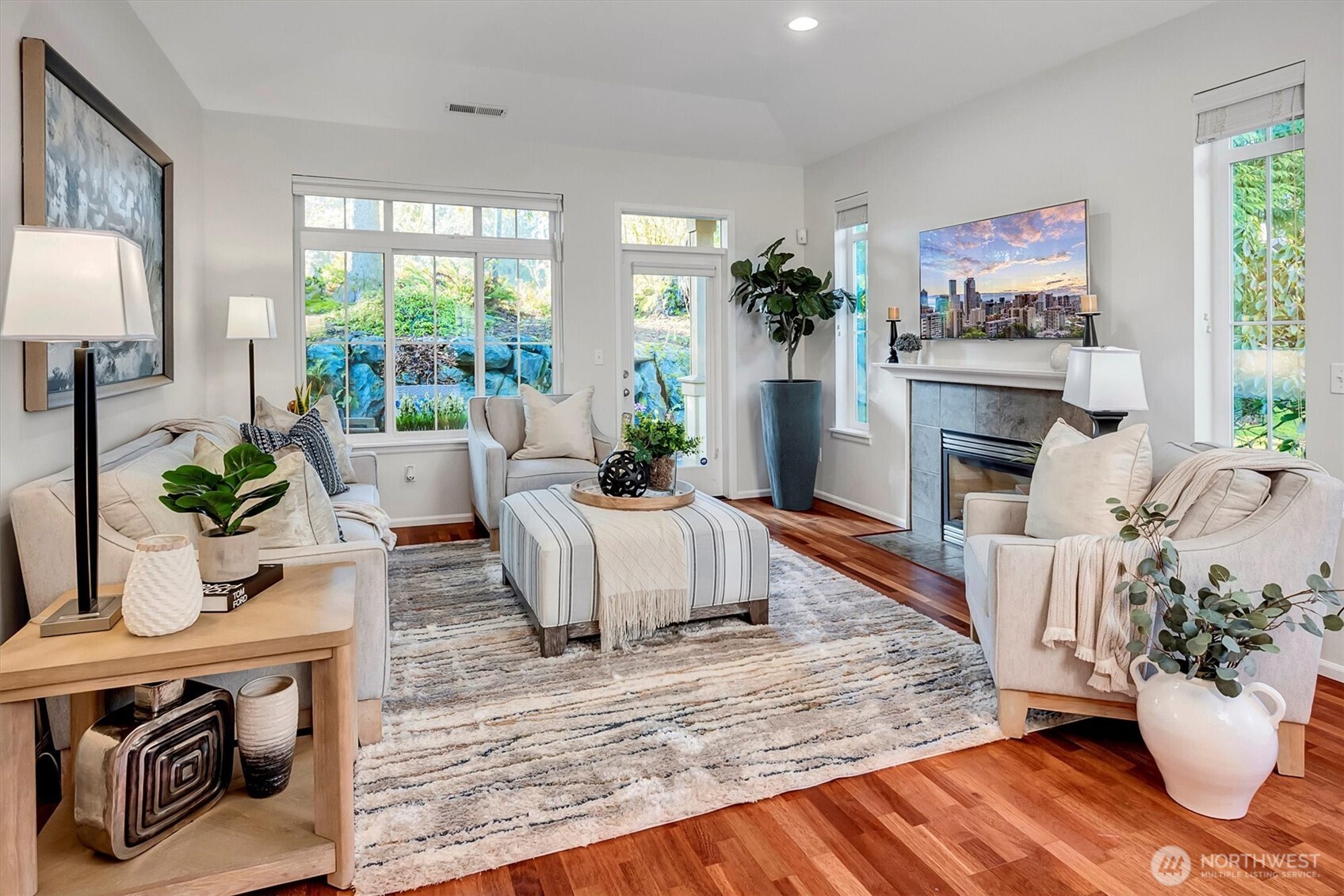 23857 Northeast 112th Circle, Unit 2 Redmond, WA 98053 - Photo 12 of 28 a living room with furniture fireplace and window