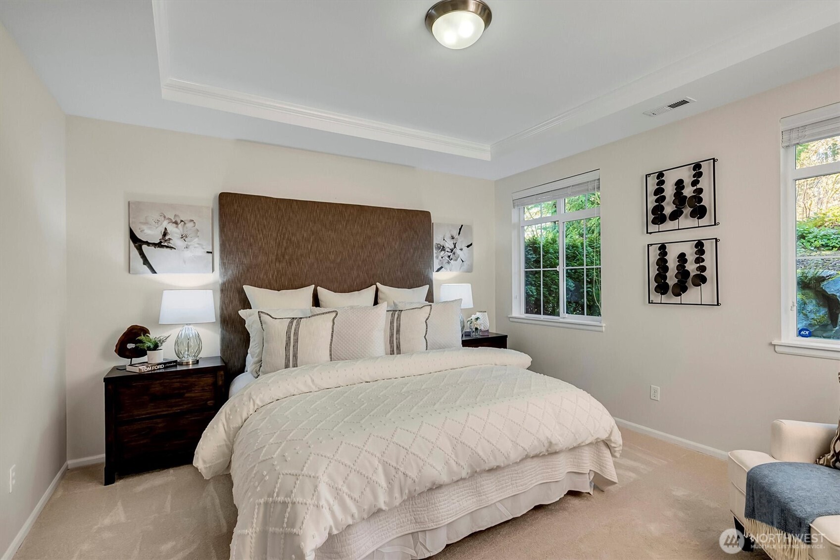 23857 Northeast 112th Circle, Unit 2 Redmond, WA 98053 - Photo 16 of 28 a bedroom with a bed and window