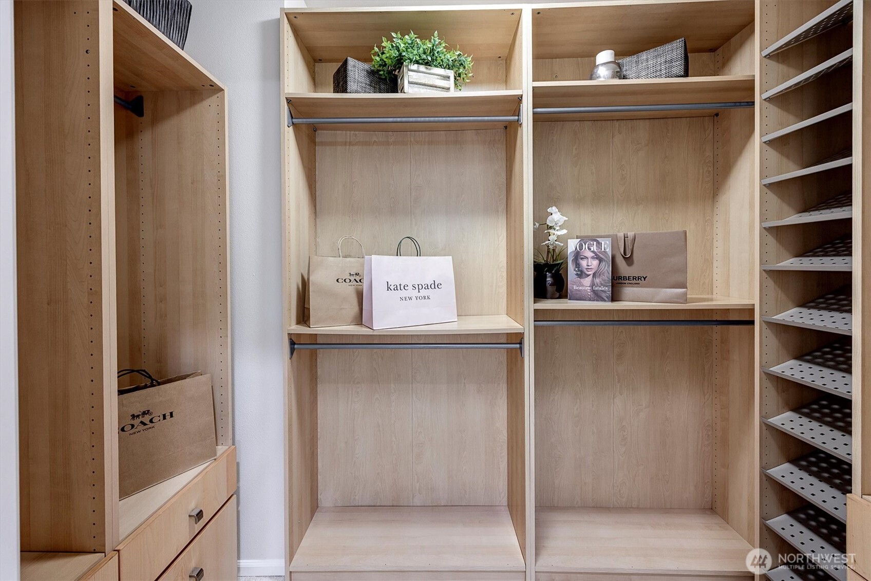 23857 Northeast 112th Circle, Unit 2 Redmond, WA 98053 - Photo 18 of 28 a room with cabinets and window