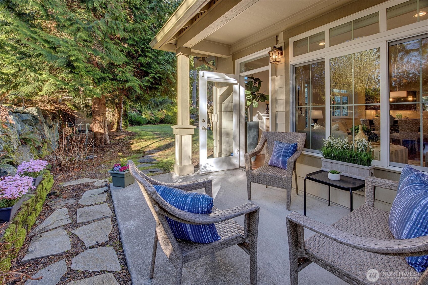 23857 Northeast 112th Circle, Unit 2 Redmond, WA 98053 - Photo 25 of 28 a backyard of a house with outdoor seating