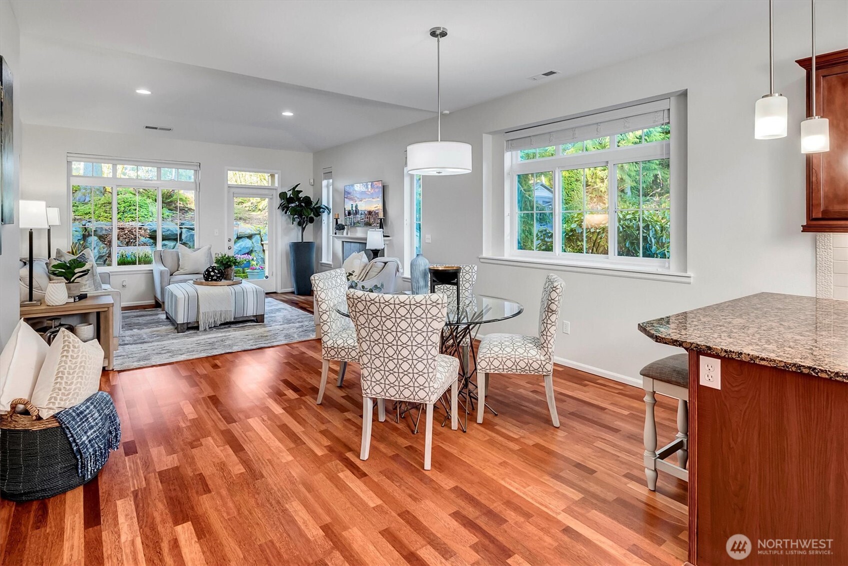 23857 Northeast 112th Circle, Unit 2 Redmond, WA 98053 - Photo 5 of 28 a dining room with furniture window wooden floor
