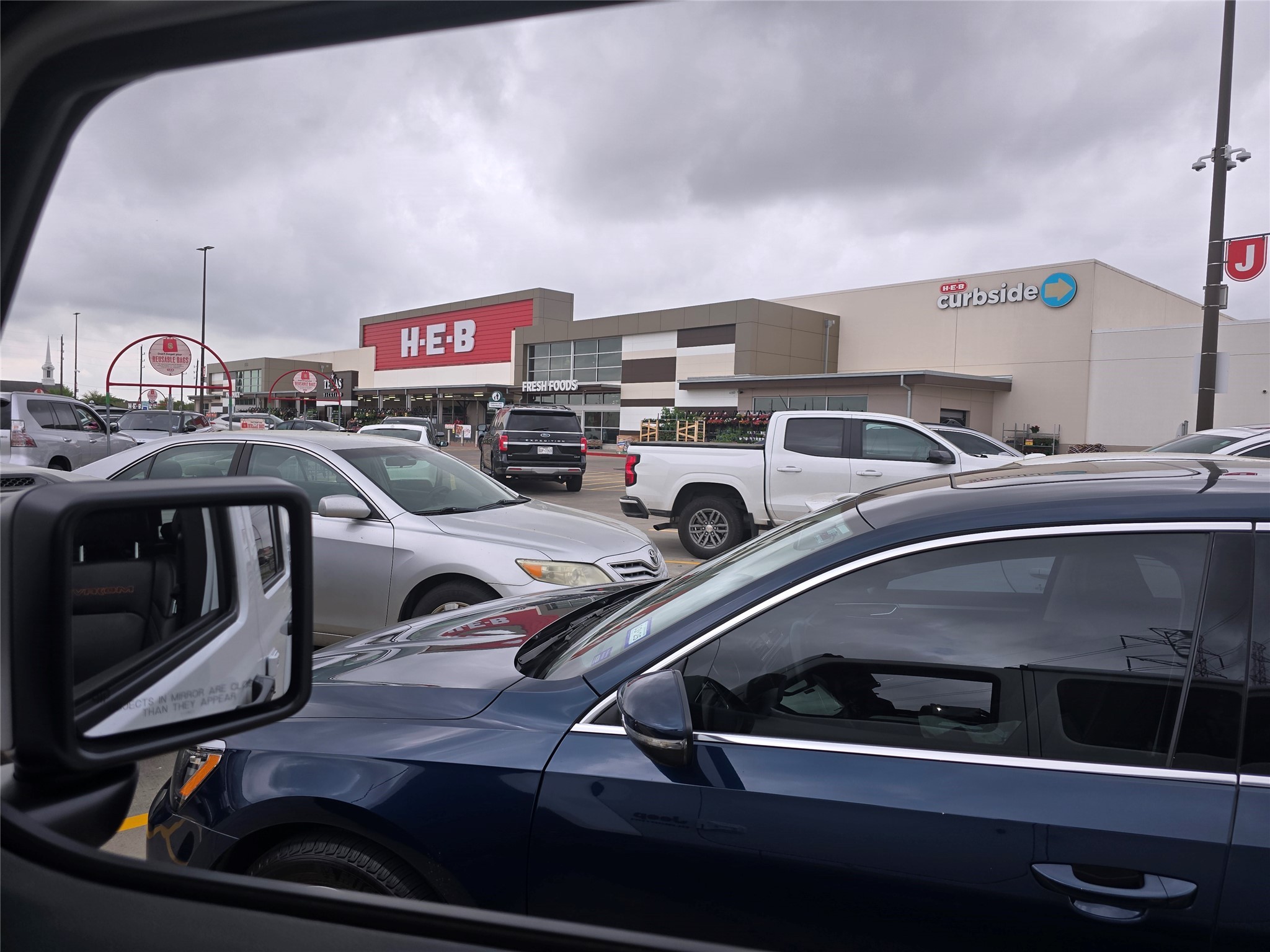 7514 Dixon Road Fulshear, TX 77441 - Photo 12 of 13 a view of a parking area