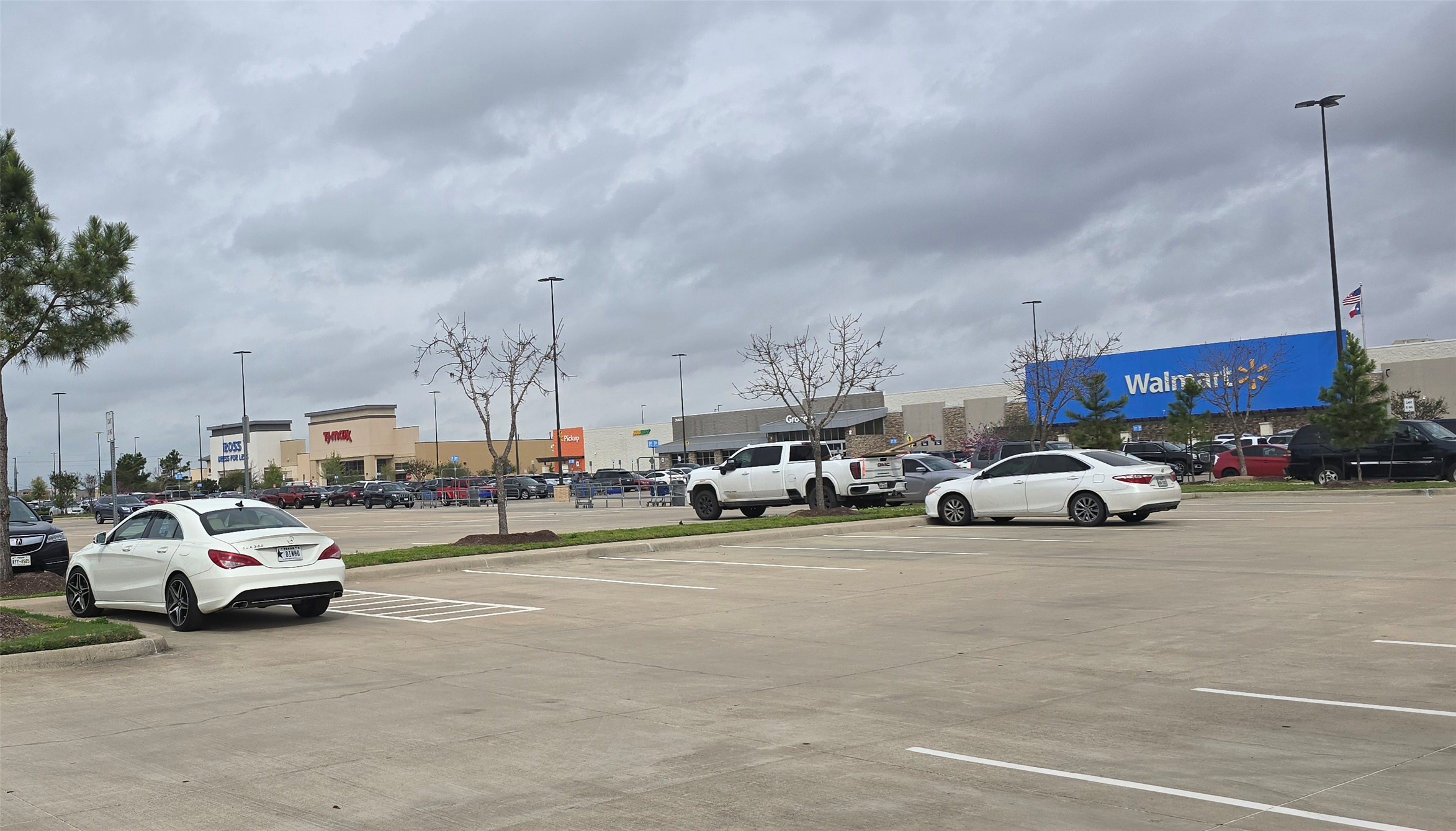 7514 Dixon Road Fulshear, TX 77441 - Photo 5 of 13 a view of cars parked in a parking lot