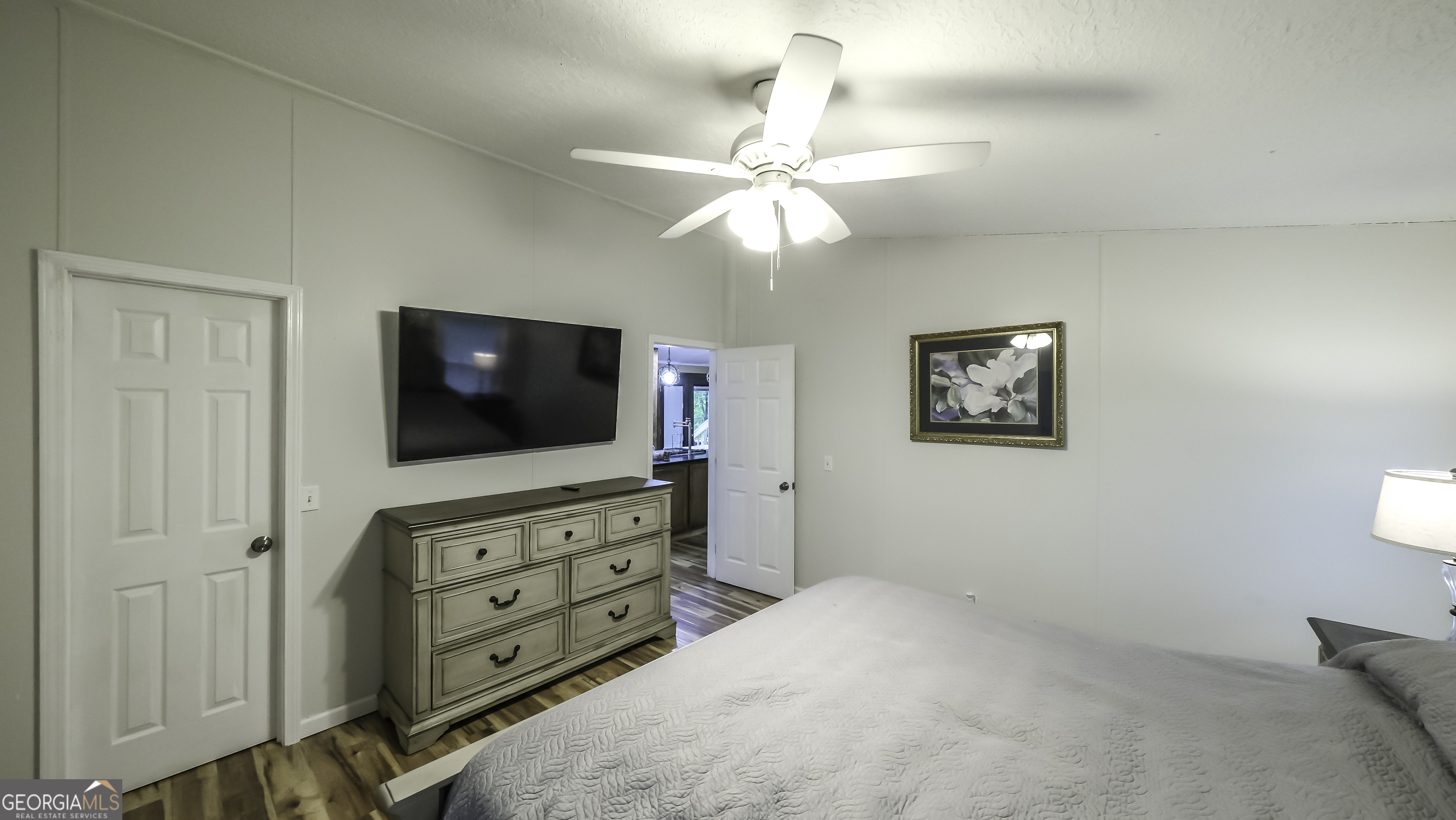 91 Holder Road Temple, GA 30179 - Photo 20 of 40 a bedroom with a bed and a flat screen tv
