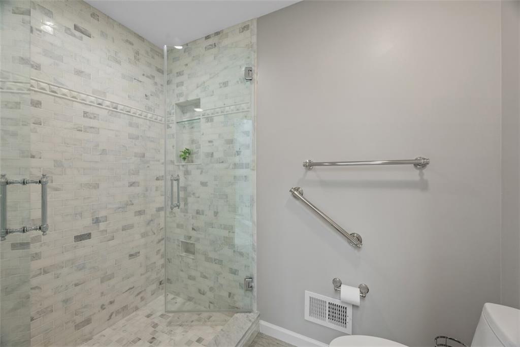 317 Blue Run Road Cheswick, PA 15024 - Photo 32 of 50 Custom tilework, shower door and fixtures