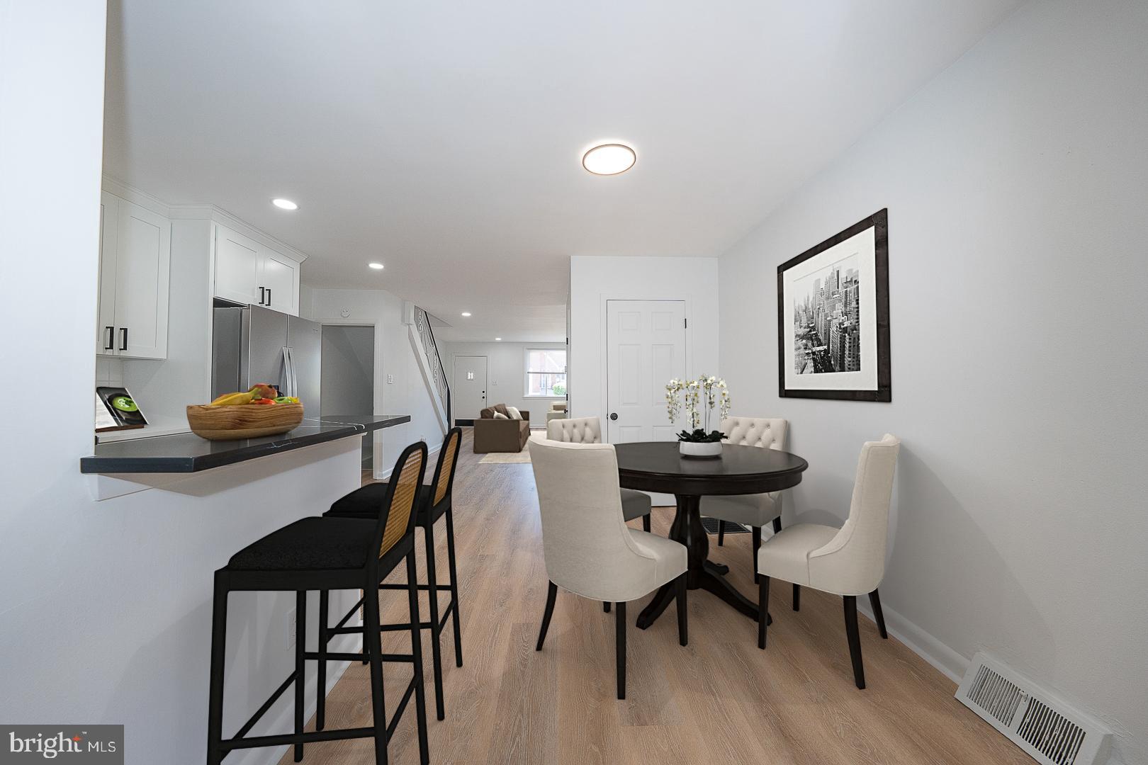 8602 Rugby Street Philadelphia, PA 19150 - Photo 8 of 22 Virtually Staged Kitchen/Dining Area