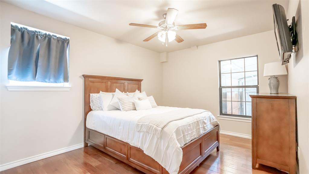 659 Aviator Drive Fort Worth, TX 76179 - Photo 11 of 40 a bedroom with a large bed and a window