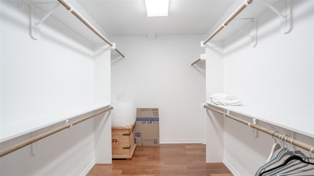 659 Aviator Drive Fort Worth, TX 76179 - Photo 15 of 40 a view of walk in closet with clothes and shoes