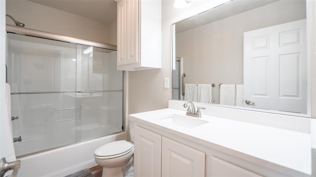 659 Aviator Drive Fort Worth, TX 76179 - Photo 17 of 40 a bathroom with a sink toilet and shower