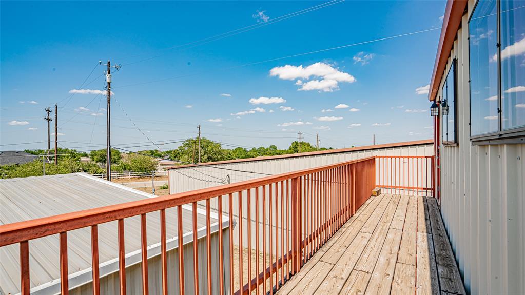 659 Aviator Drive Fort Worth, TX 76179 - Photo 26 of 40 a view of a balcony with wooden floor