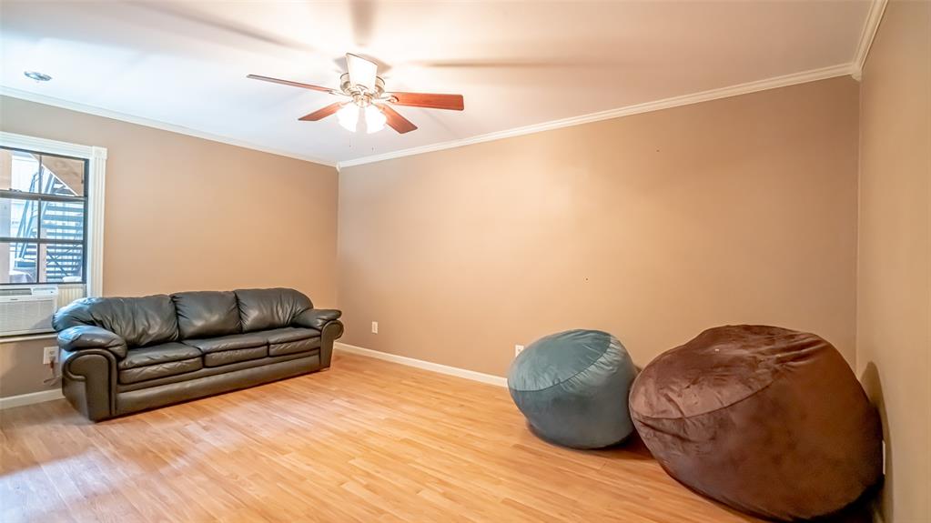 659 Aviator Drive Fort Worth, TX 76179 - Photo 31 of 40 a living room with furniture and a wooden floor