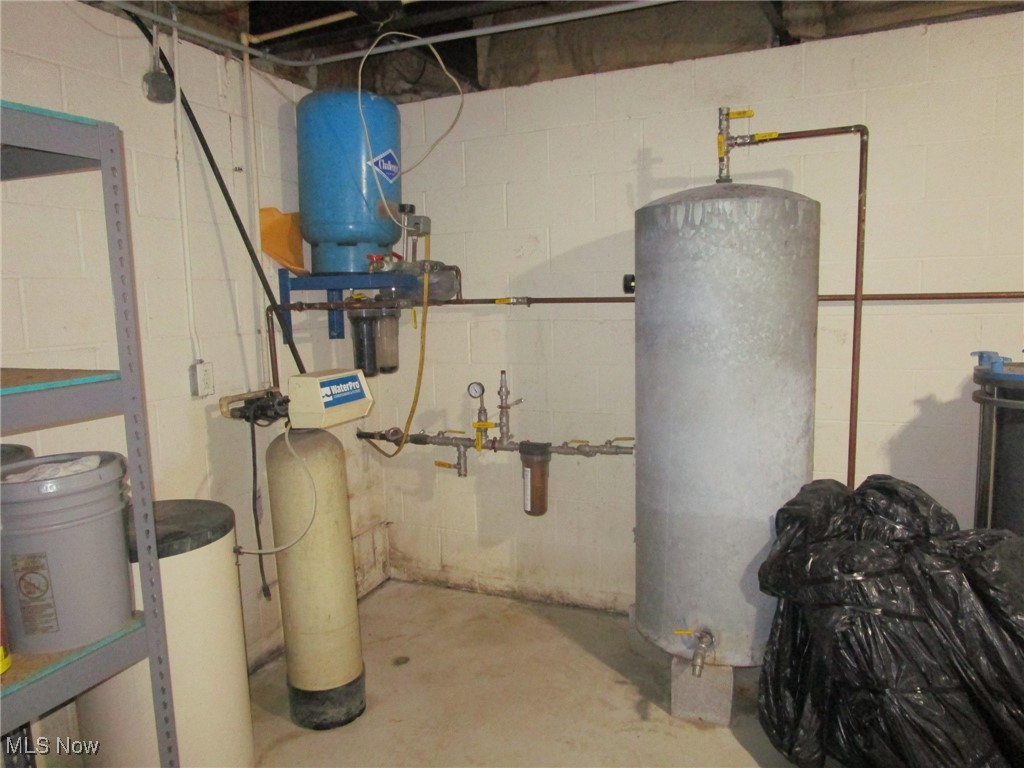 750 Webster Road Jefferson, OH 44047 - Photo 38 of 48 Water treatment system w/ settling tank