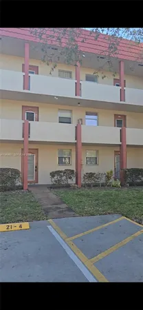 a kitchen with granite countertop a stove and a sink
