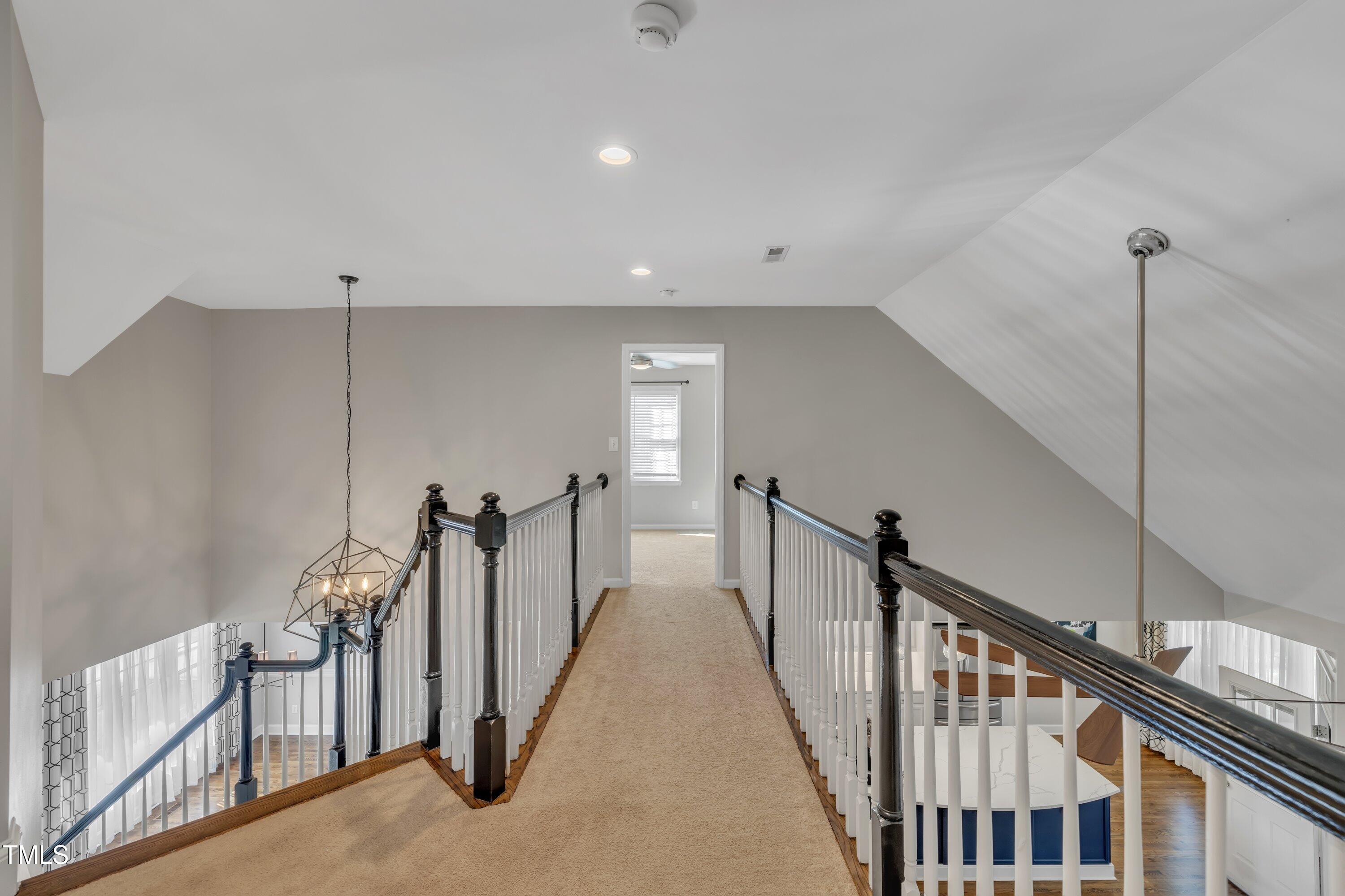 7505 Nichols Road Raleigh, NC 27615 - Photo 38 of 45 upstairs catwalk/hallway