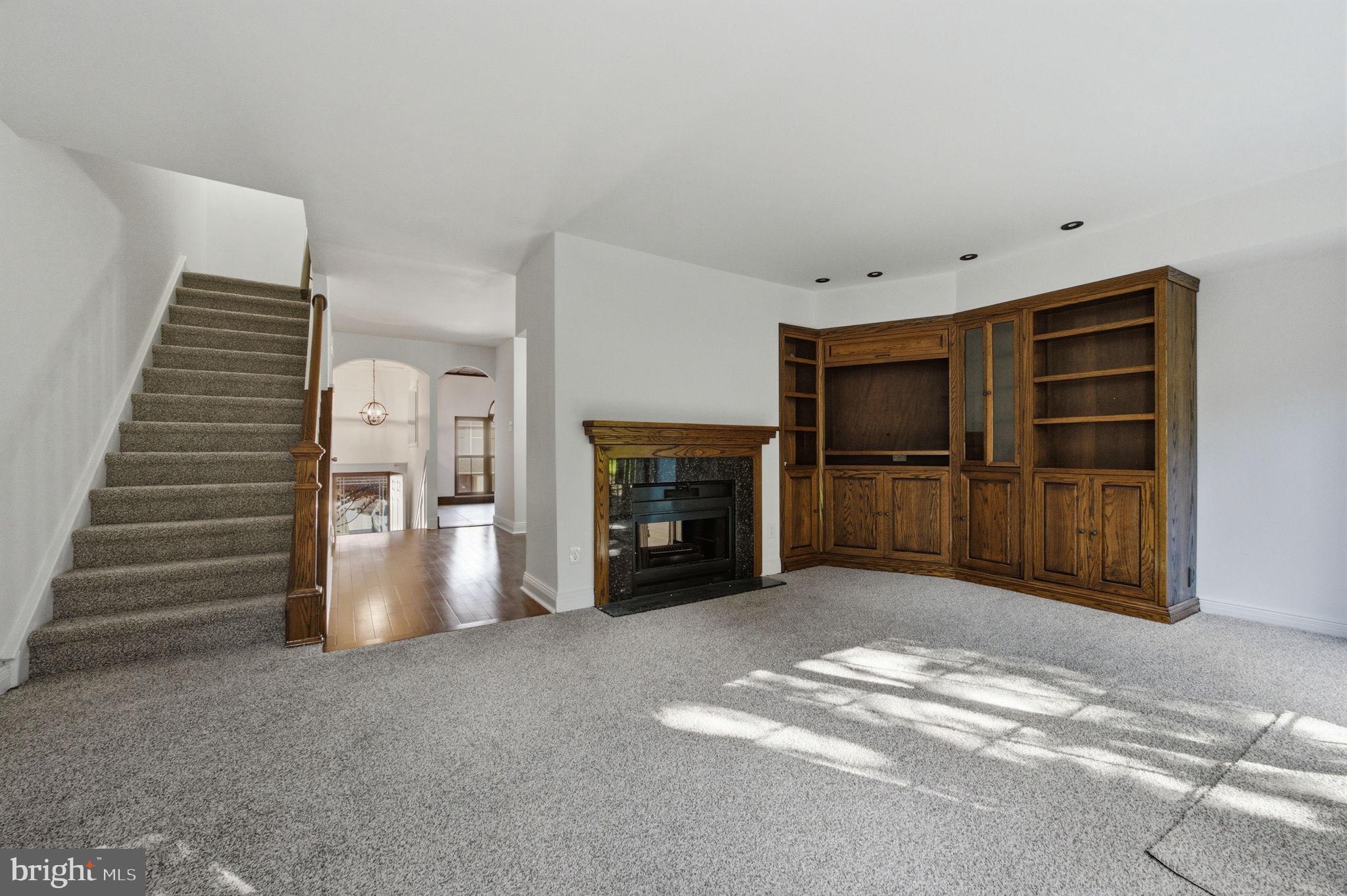 3305 Keswick Way, Unit 3305D Newtown Square, PA 19073 - Photo 13 of 38 a view of a livingroom with a fireplace