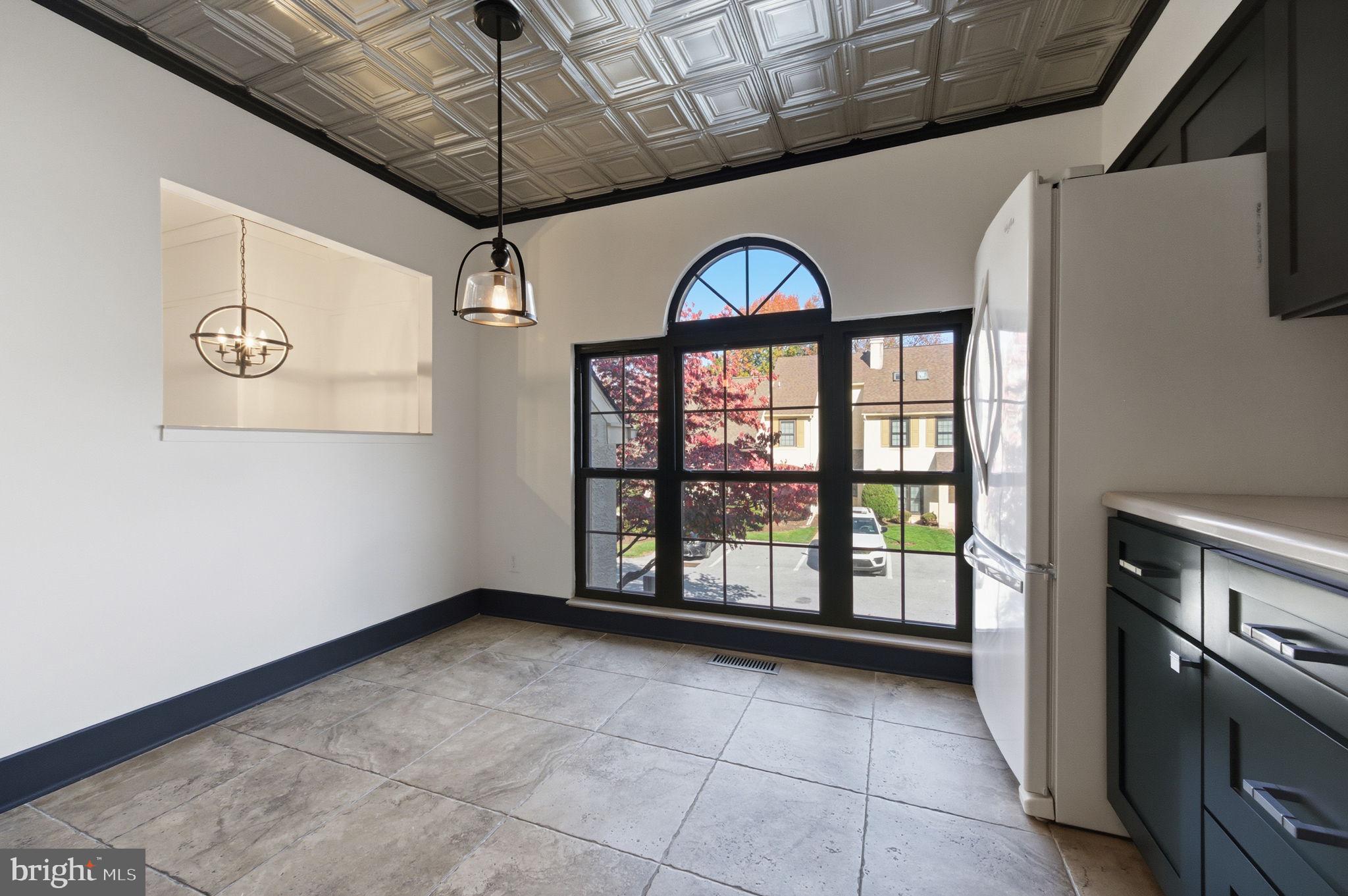 3305 Keswick Way, Unit 3305D Newtown Square, PA 19073 - Photo 19 of 38 a view of an empty room with a window