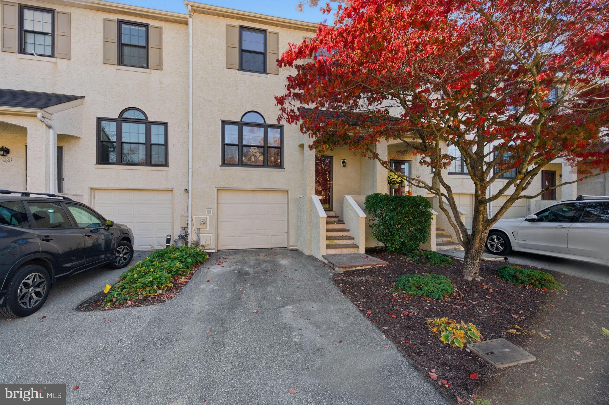 3305 Keswick Way, Unit 3305D Newtown Square, PA 19073 - Photo 2 of 38 a car parked in front of a house