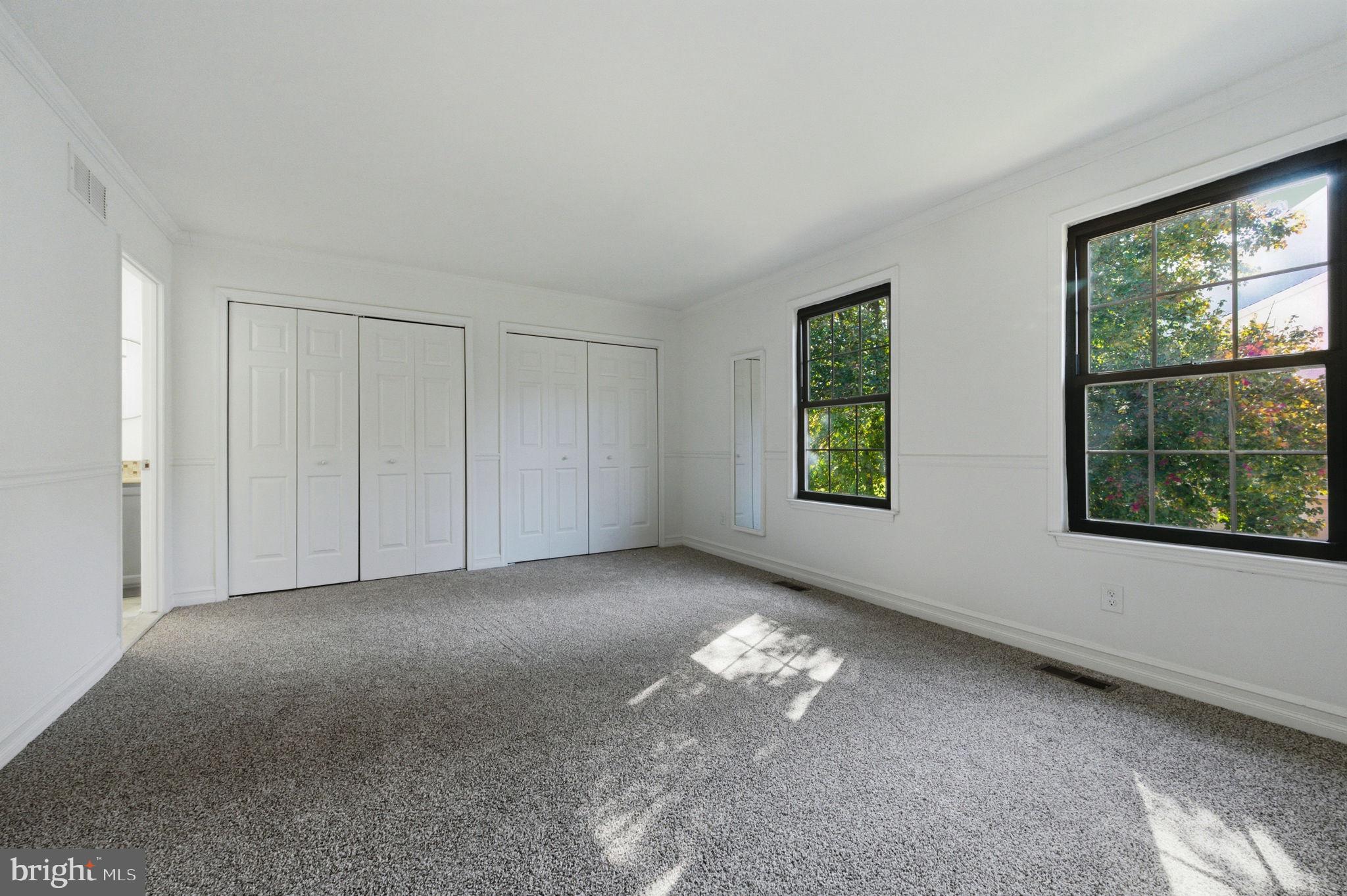 3305 Keswick Way, Unit 3305D Newtown Square, PA 19073 - Photo 30 of 38 a view of an empty room with a window