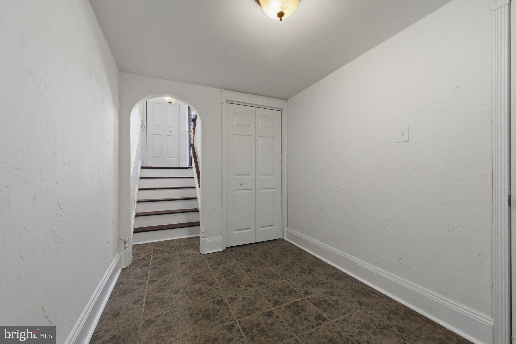 3305 Keswick Way, Unit 3305D Newtown Square, PA 19073 - Photo 37 of 38 an empty room with a staircase