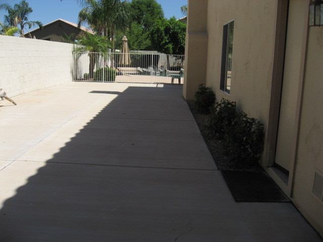 2106 East Victor Road Gilbert, AZ 85296 - Photo 18 of 22 concrete pad on west side of home