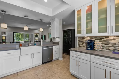 a view of cabinets and window