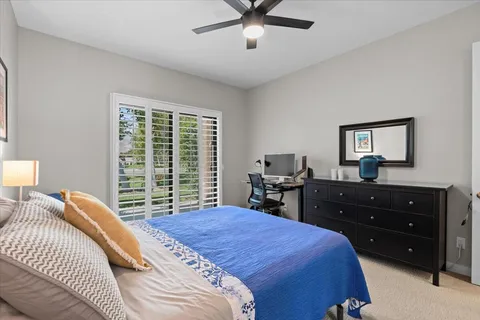 a bedroom with a bed and furniture