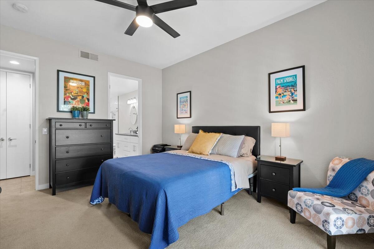 67527 North Portales Drive Cathedral City, CA 92234 - Photo 17 of 47 a bedroom with a bed and furniture