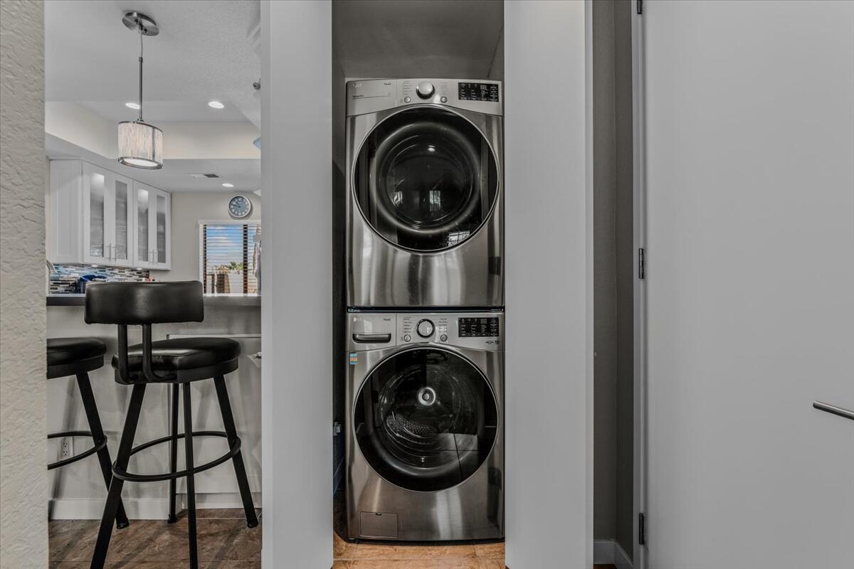 67527 North Portales Drive Cathedral City, CA 92234 - Photo 24 of 47 a view of a hallway with washer and dryer
