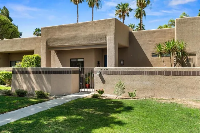a garden view with a seating space